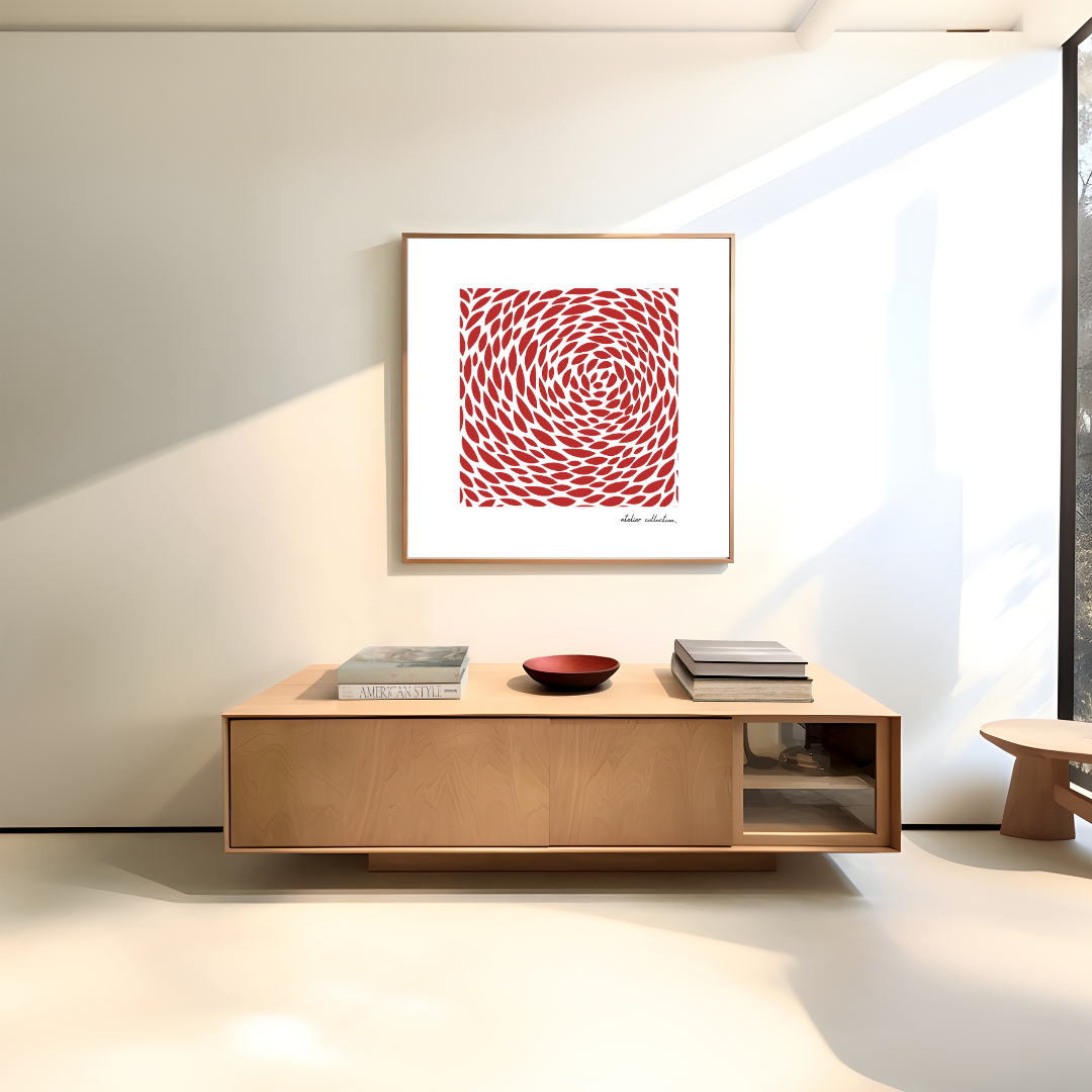 הדפס אמנות גיאומטרי "קאיו" מאת The Left Handed – דפוס דינמי של צורות אדומות יוצרות אפקט תנועה במרכז היצירה, ממוסגר במסגרת עץ טבעית.