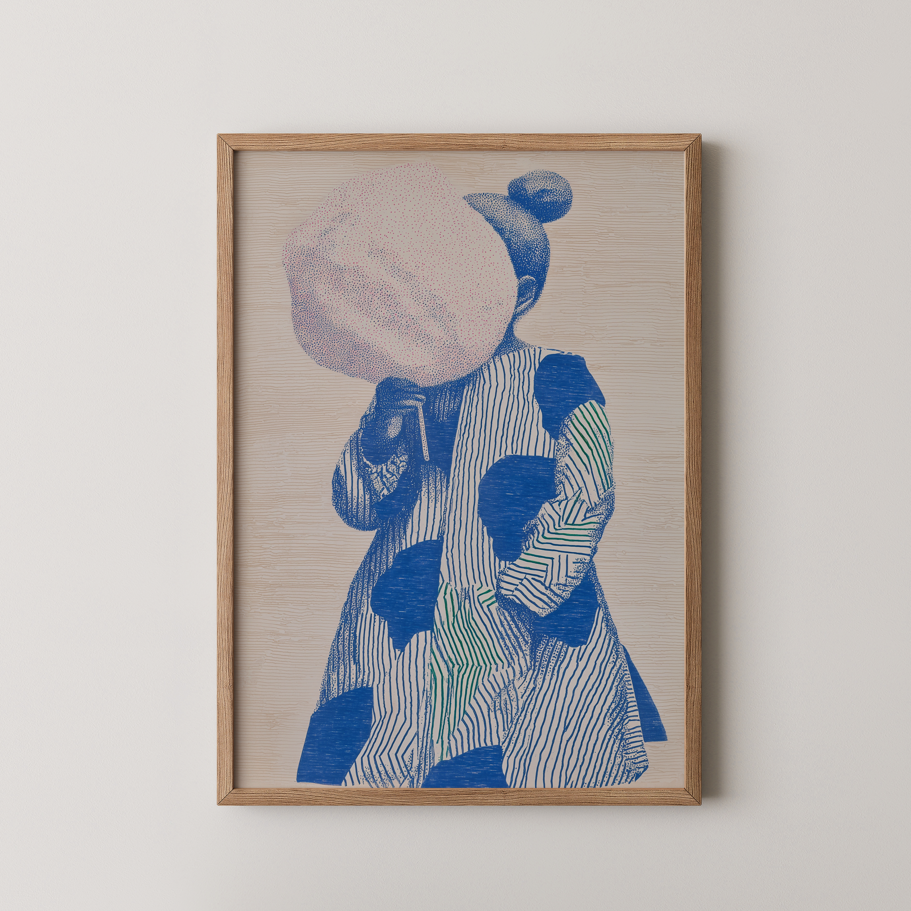 Miette – יצירה ממוסגרת של דמות כחולה עם ממתק ורוד