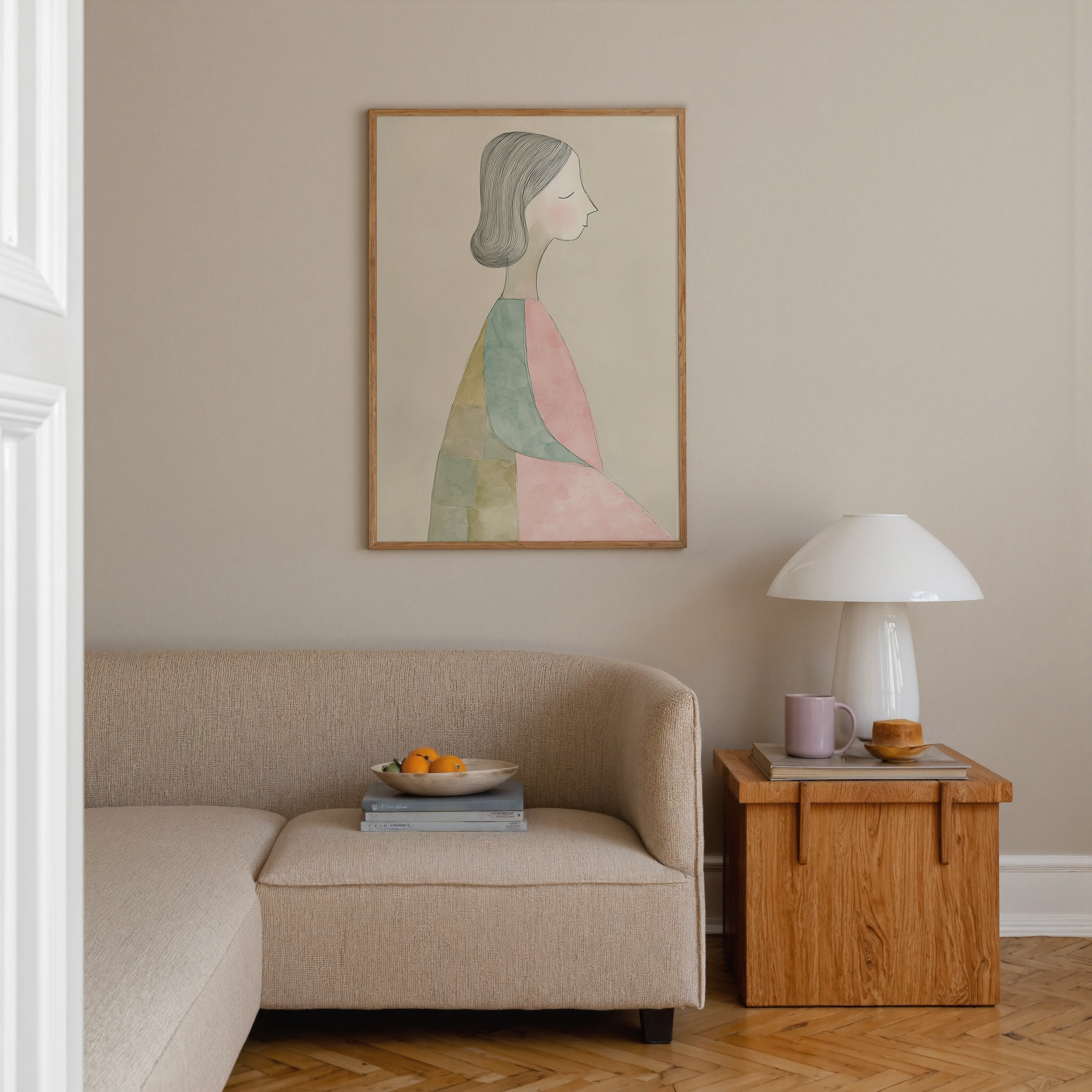 יצירה ממוסגרת של דמות נשית בפרופיל, בקווים עדינים ובגווני ורוד וירוק, בסגנון איור מינימליסטי, מתוך קולקציית הדמויות של Trausi+Tosh.
