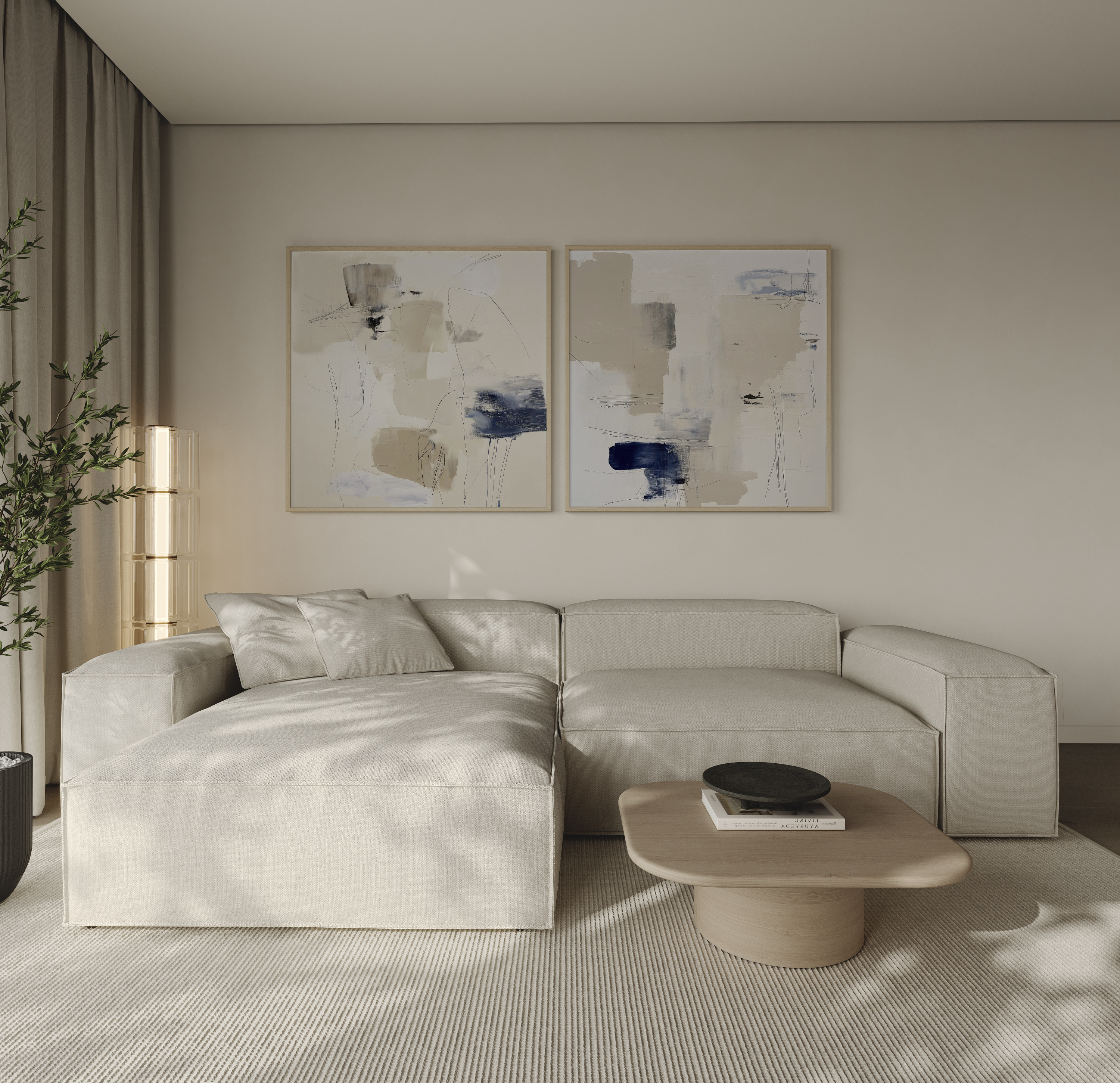 סט יצירות מופשטות בגווני שמנת, בז’ וכחול עמוק במסגרת עץ טבעי בחלל מודרני מינימליסטי