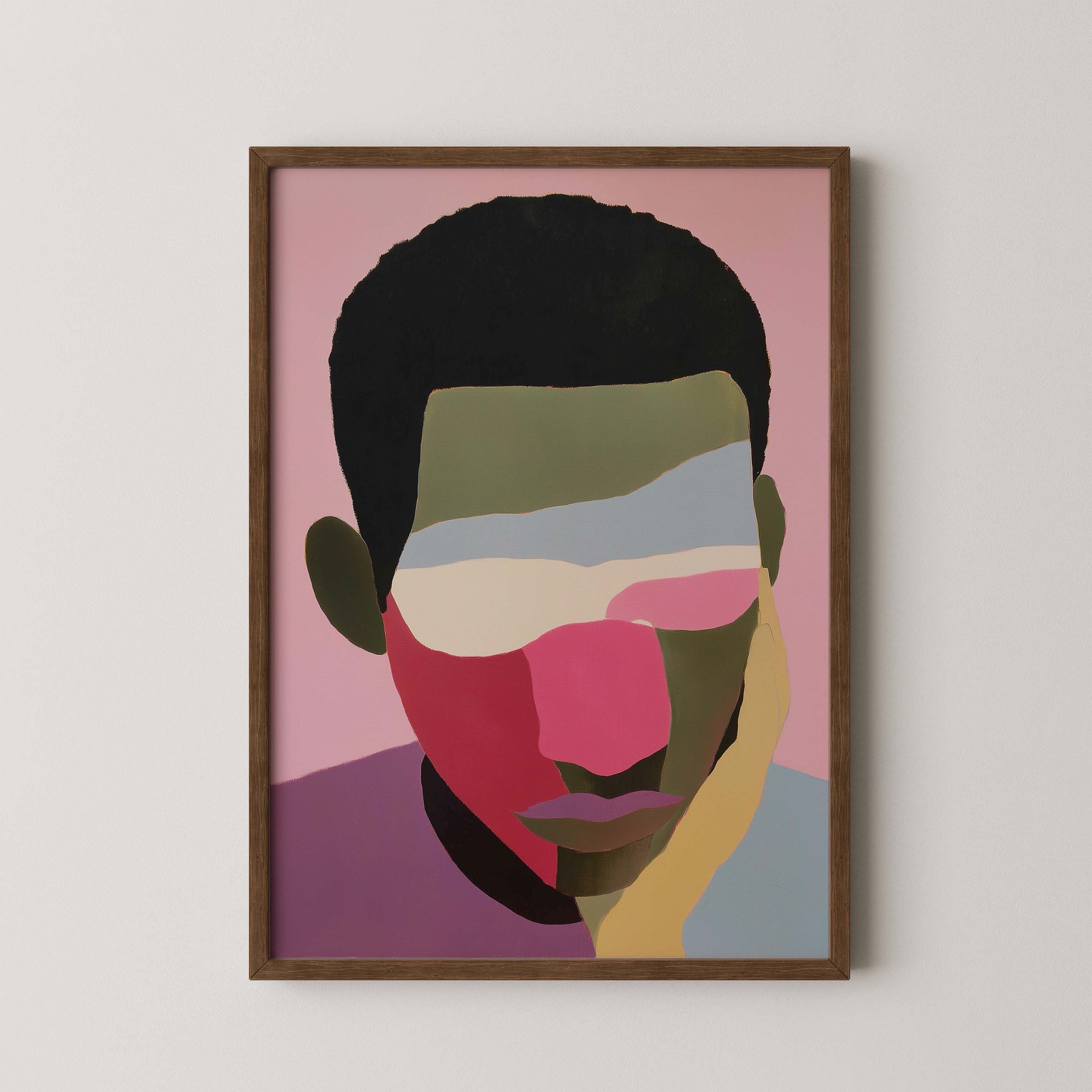 יצירה ממוסגרת של דיוקן גברי מופשט בגווני ורוד, ירוק ותכלת – Isandro מבית Trausi+Tosh